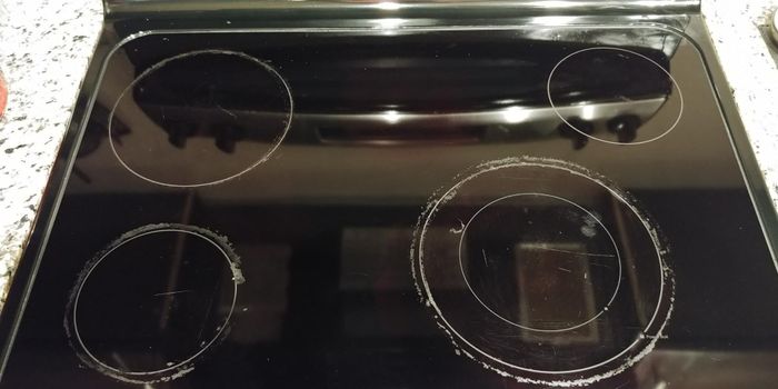 A reviewer's oven after using the scrubbing pads