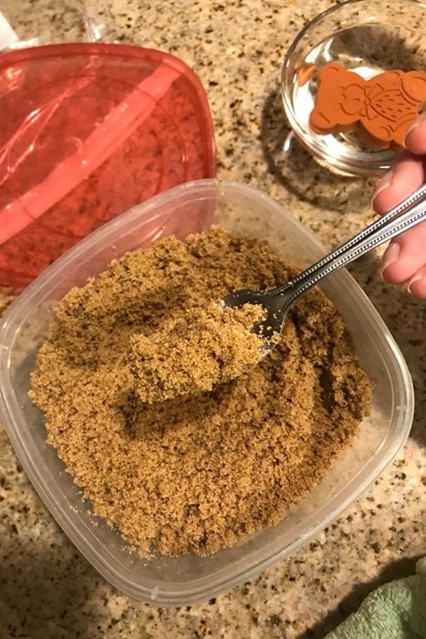 A reviewer's photo showing the same container now filled with soft, perfectly usable brown sugar