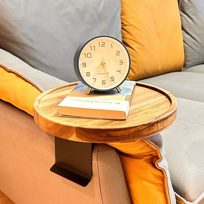 wooden clip-on table attached to the arm of a sofa