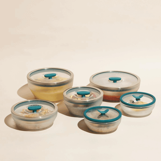 A set of six microwaveable bowls with lids.