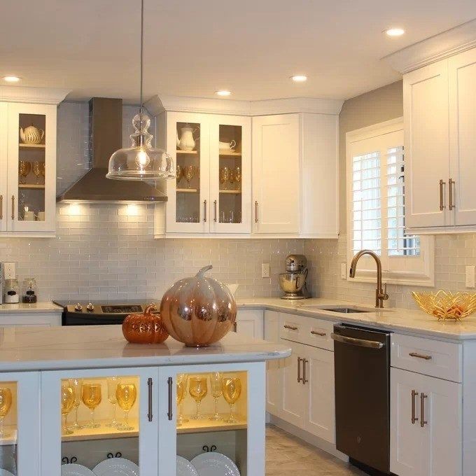 reviewer's photo of the faucet installed in a kitchen
