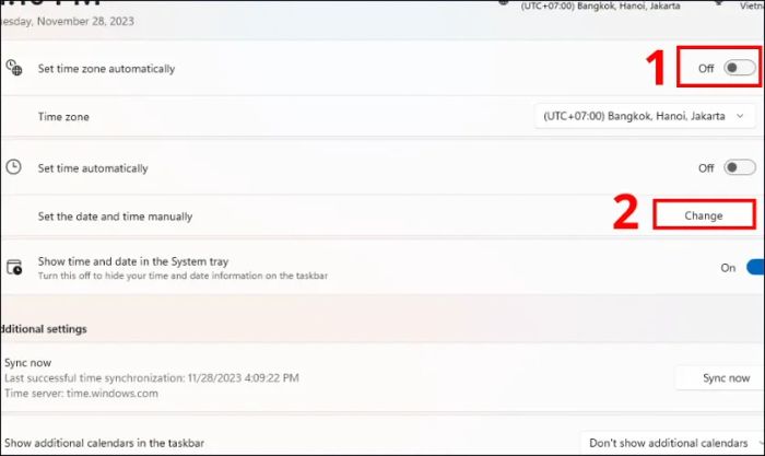 Tắt Set time automatically, rồi chọn Change