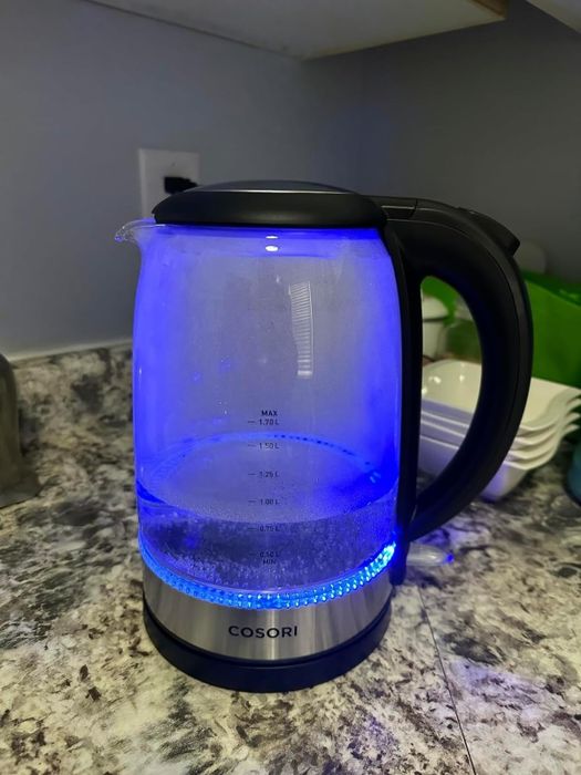 The electric kettle sitting on a kitchen counter