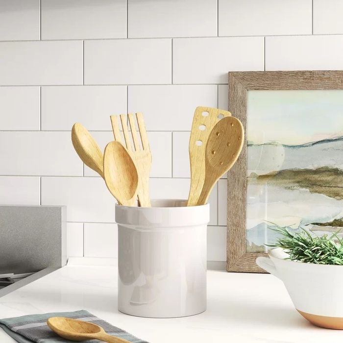 The utensil crock placed on the countertop