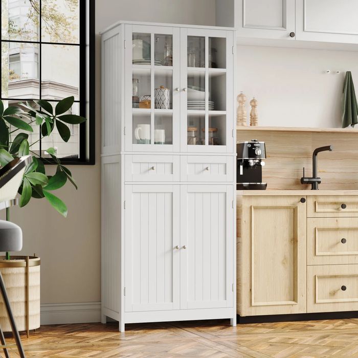 A white pantry featuring two cabinets and two drawers, with glass doors on the top half, perfect for displaying and organizing your kitchen essentials