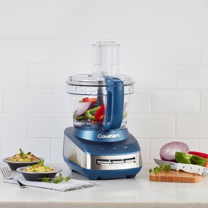 A Cuisinart food processor sitting on a kitchen counter
