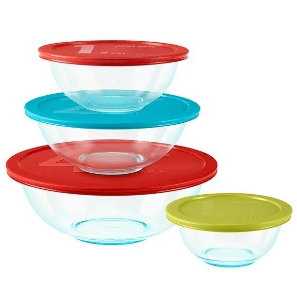 A set of bowls in various sizes, each with its matching lid