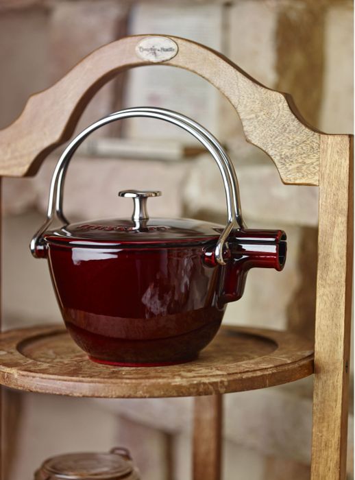 The Staub cast-iron kettle with a sturdy handle.