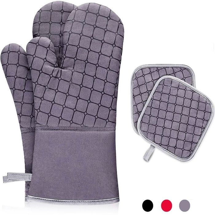 A pair of oven mitts alongside matching pot holders