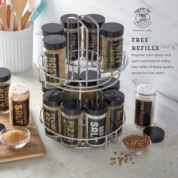 the spice rack displayed on a counter with a note highlighting five years of free spice refills