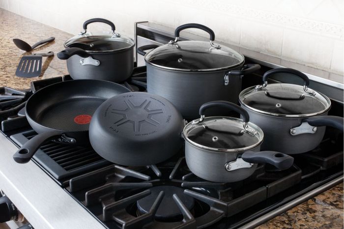 The cookware set placed on a stovetop