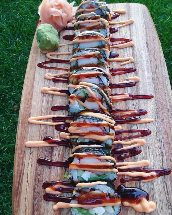 The same reviewer’s photo of their homemade sushi, now topped with a delicious drizzle of sauce.
