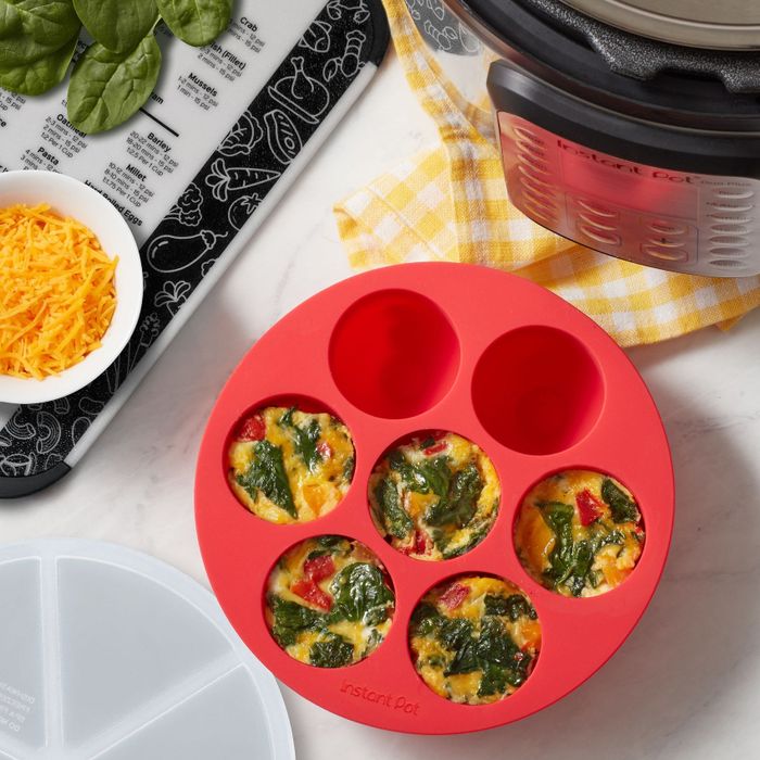 A red pan filled with cooked egg bites