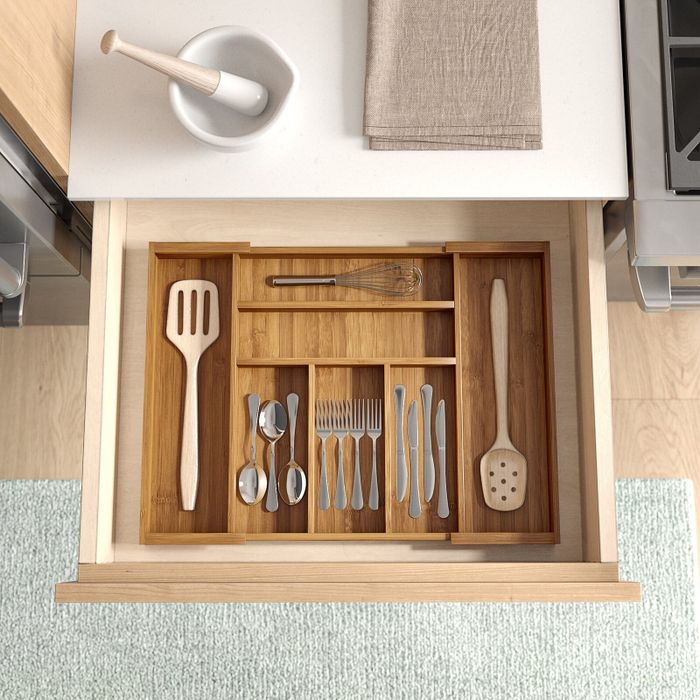 The utensil organizer placed inside a drawer