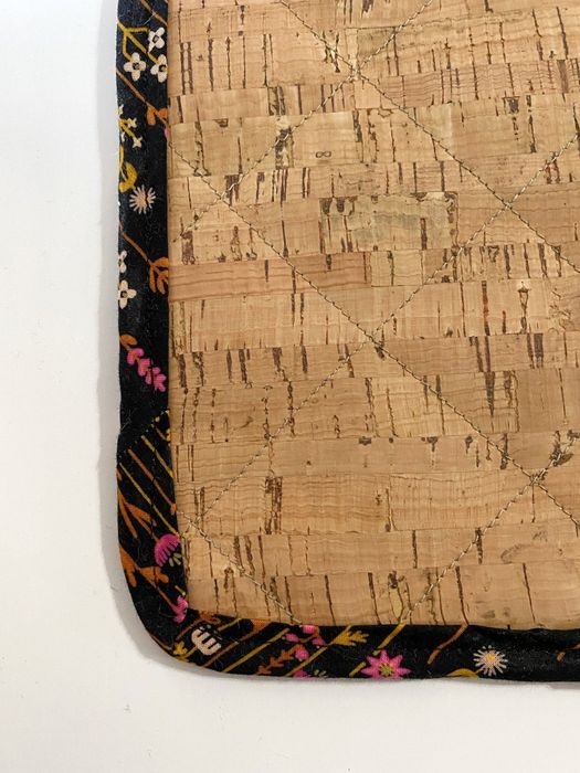 The cork-lined potholder