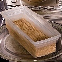 Pasta cooking inside the transparent microwave pasta maker