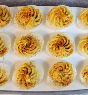 A close-up of a reviewer’s deviled eggs, neatly arranged on the tray