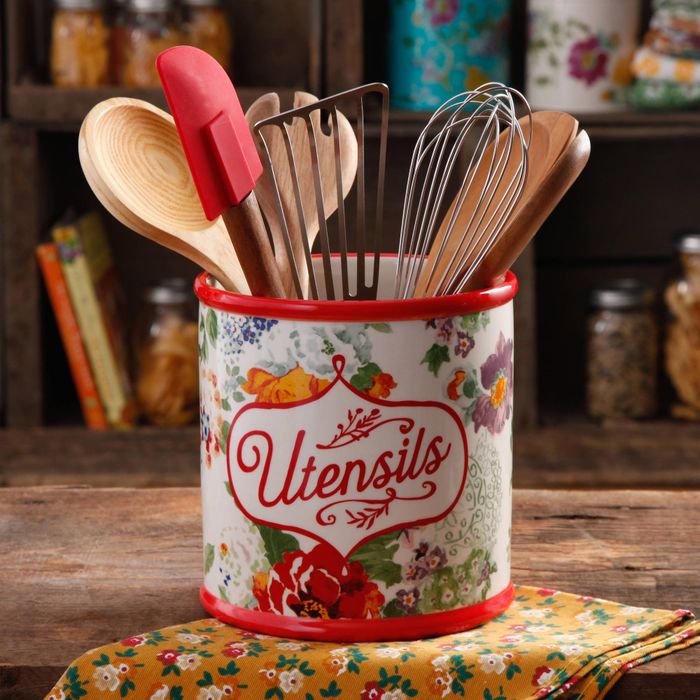 a floral-patterned cylinder labeled
