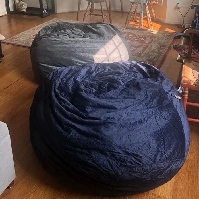 Reviewer photo featuring blue and gray bean bag chairs