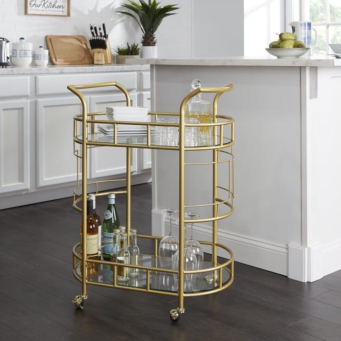 A bar cart with beverages and glasses on the bottom shelf and dishes on the top