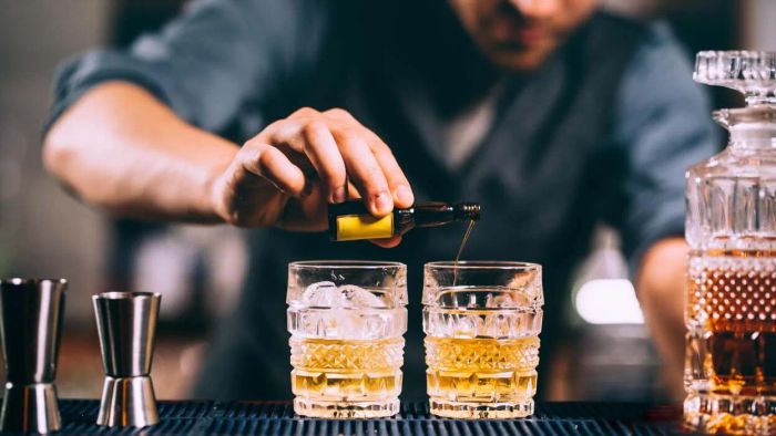 The waiter pressures you into ordering a cocktail