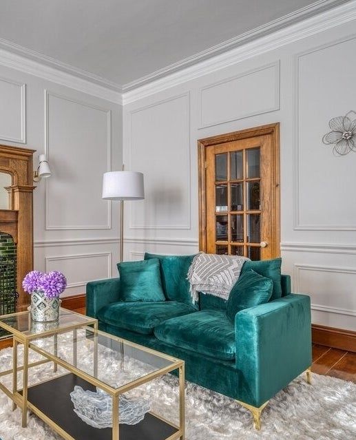 a customer photo of the green loveseat
