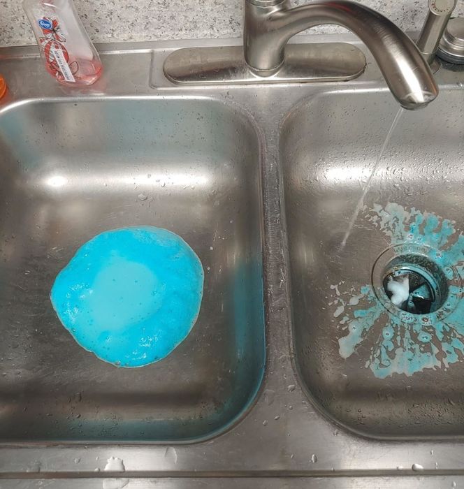 reviewer photo showing the foaming cleaner bubbling through the drains of their kitchen sink
