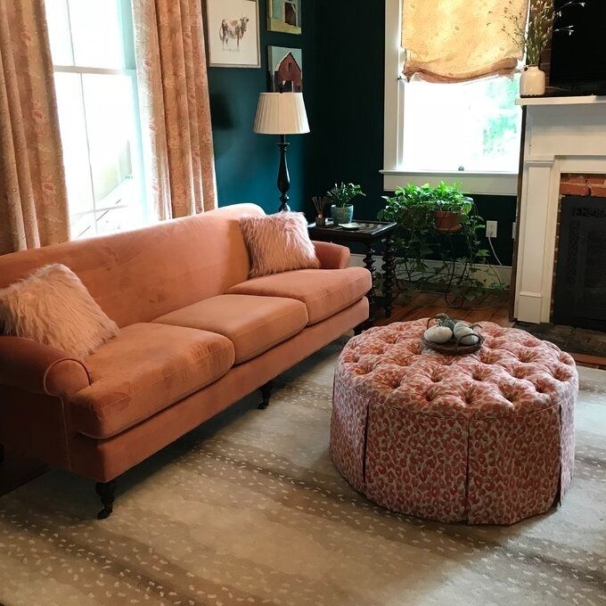 a customer photo of the orange-peach sofa