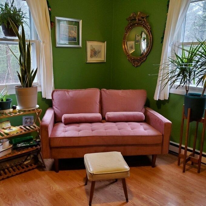 a customer photo of the rose-colored loveseat