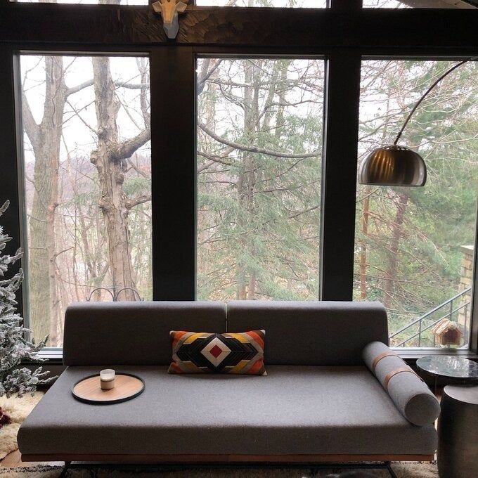 a customer photo of the dark gray sofa