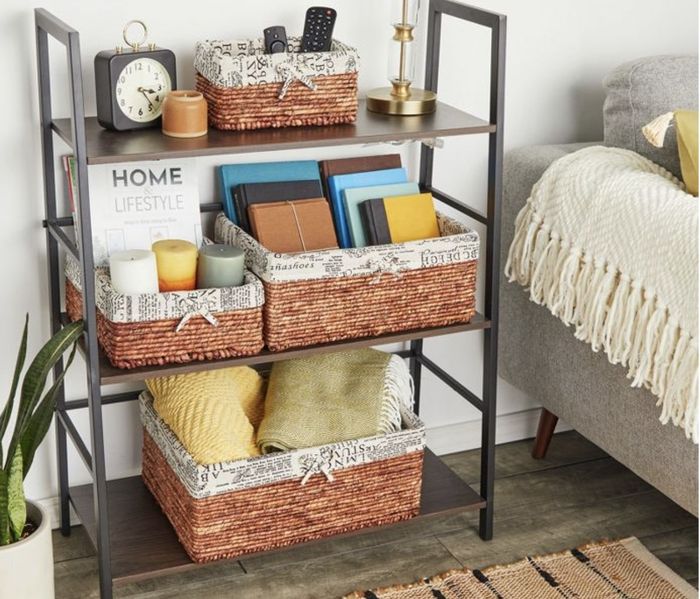 The storage baskets filled with various items placed neatly on shelves.