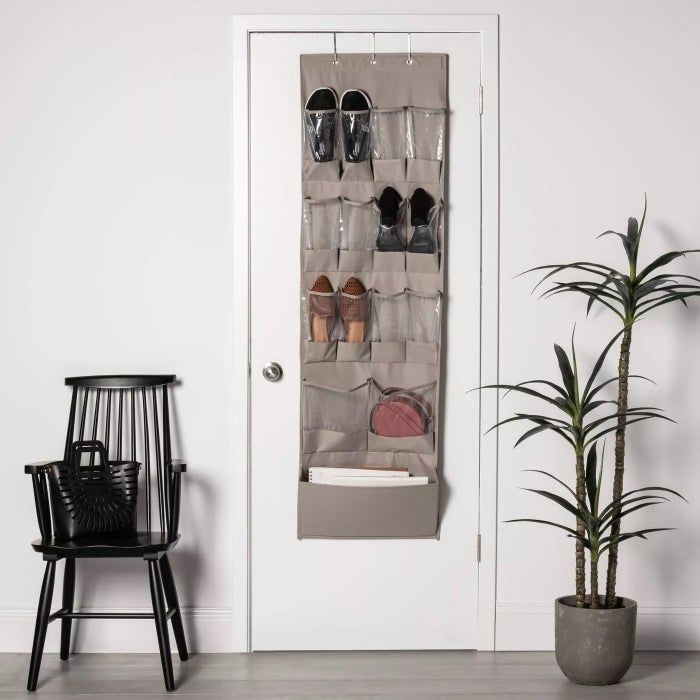 The over-the-door organizer filled with various items