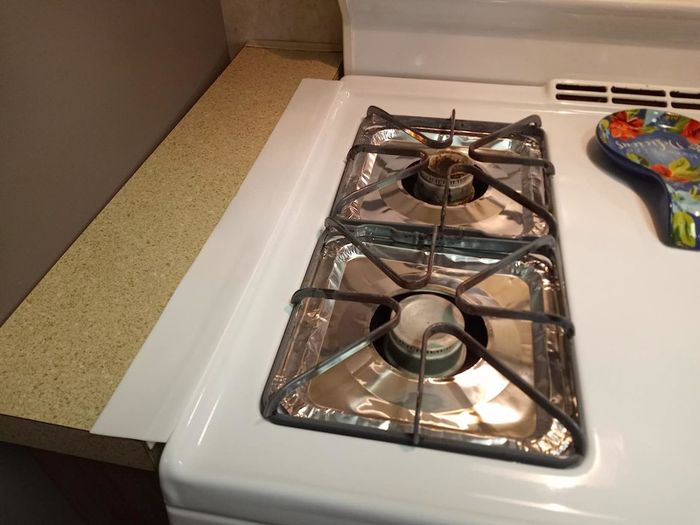 Reviewer's white stove with a white gap cover sealing the space between the counter