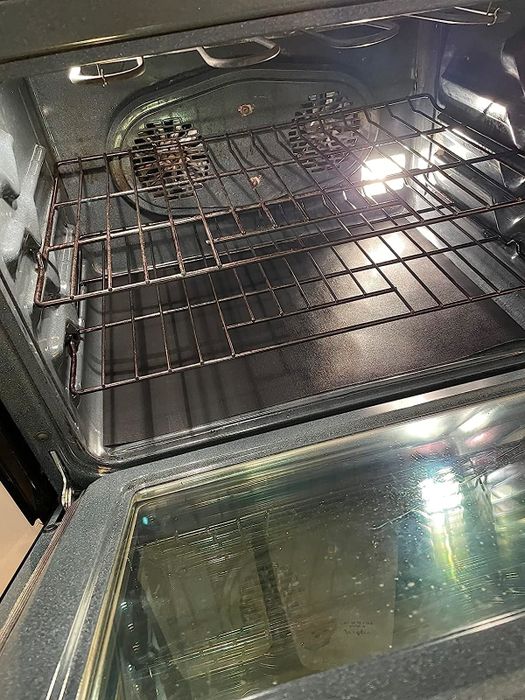 Reviewer's oven with a liner placed on the bottom surface.