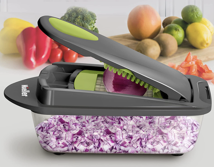 Container with the slicer on top and chopped onion inside.