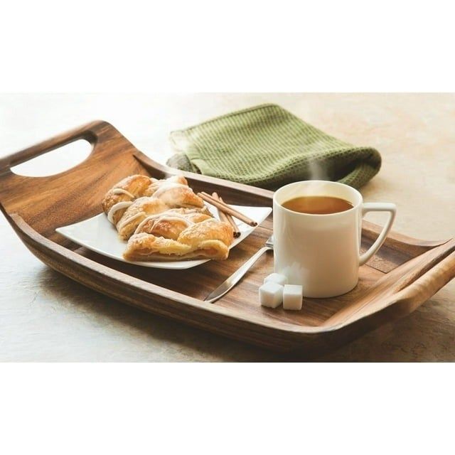 the tray with breakfast and coffee on it