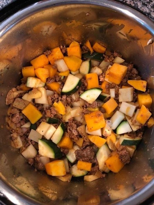 reviewer photo of the Instant Pot preparing chorizo sausage, butternut squash, and zucchini
