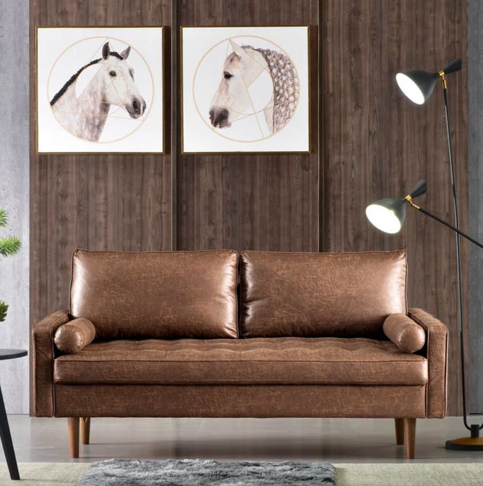 a compact brown leather loveseat