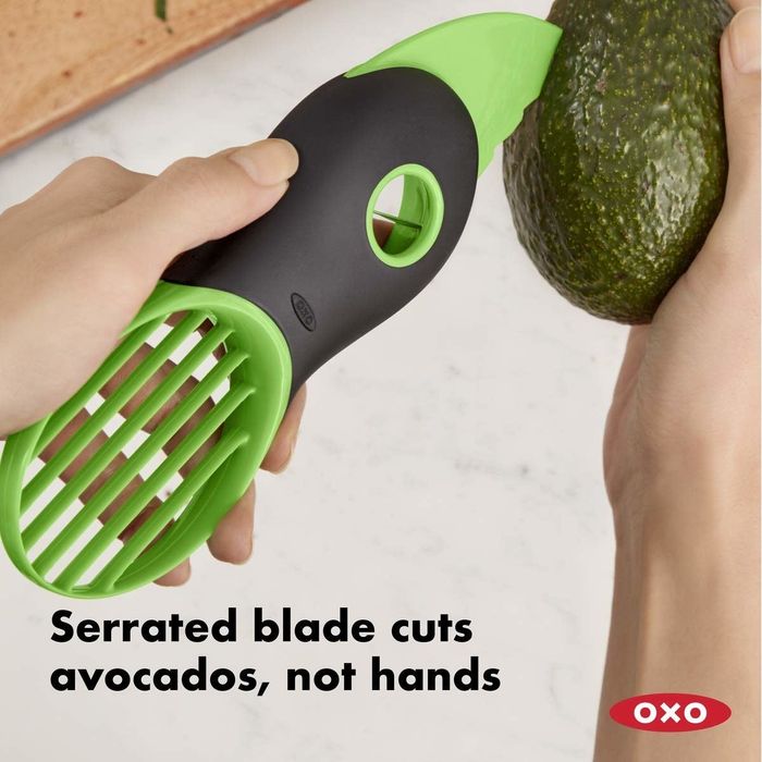 A hand slicing an avocado with text on the image that says, 