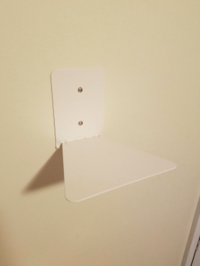 Reviewer photo of the empty floating bookshelf