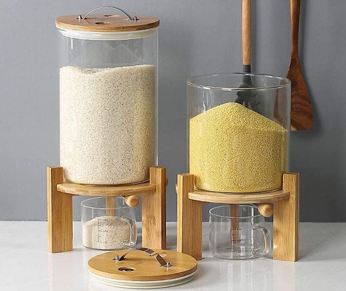Two rice dispensers, one small and one large, are displayed