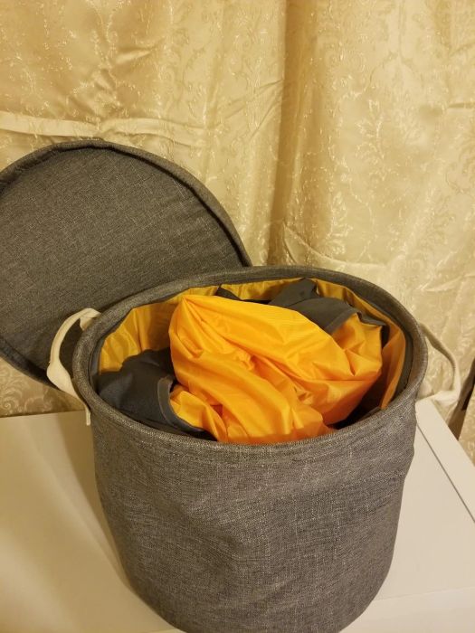 The mat is neatly rolled back into the storage bag