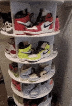A gif showing another reviewer's rotating shoe rack holding several pairs of sneakers