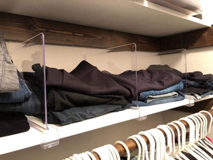 A reviewer’s closet showing the translucent dividers neatly organizing their clothing
