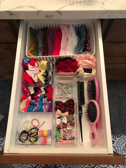Another reviewer’s drawer, now tidy with organizers holding hair care supplies.