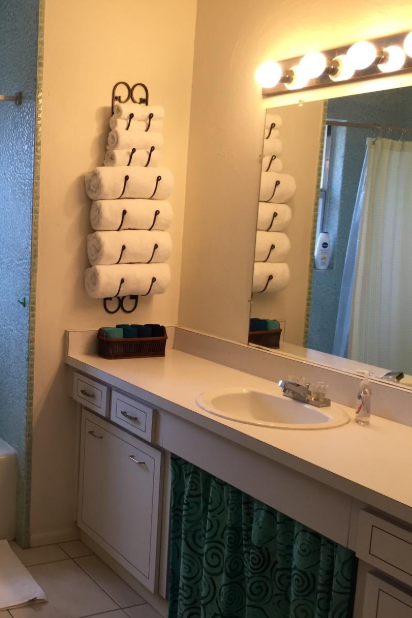 The mounted towel rack in place