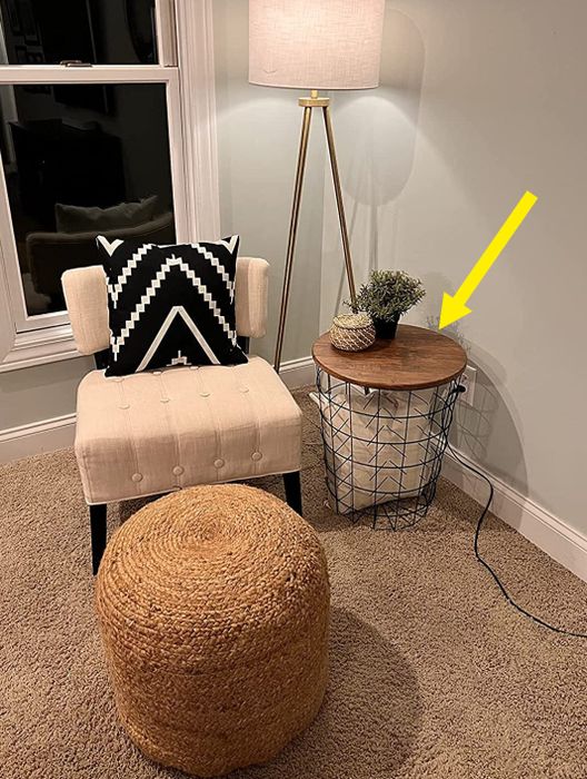 a reviewer showcases it being used as a side table