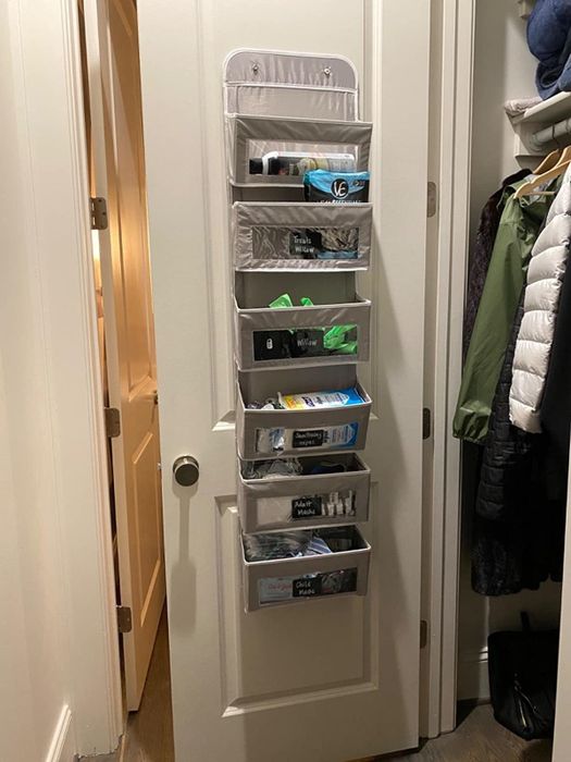 Reviewer’s photo showing the over-the-door shelves filled with various items.
