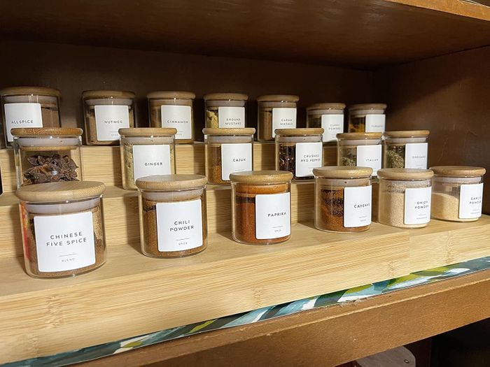 A reviewer’s spices organized in clear glass jars with neat labels on them.