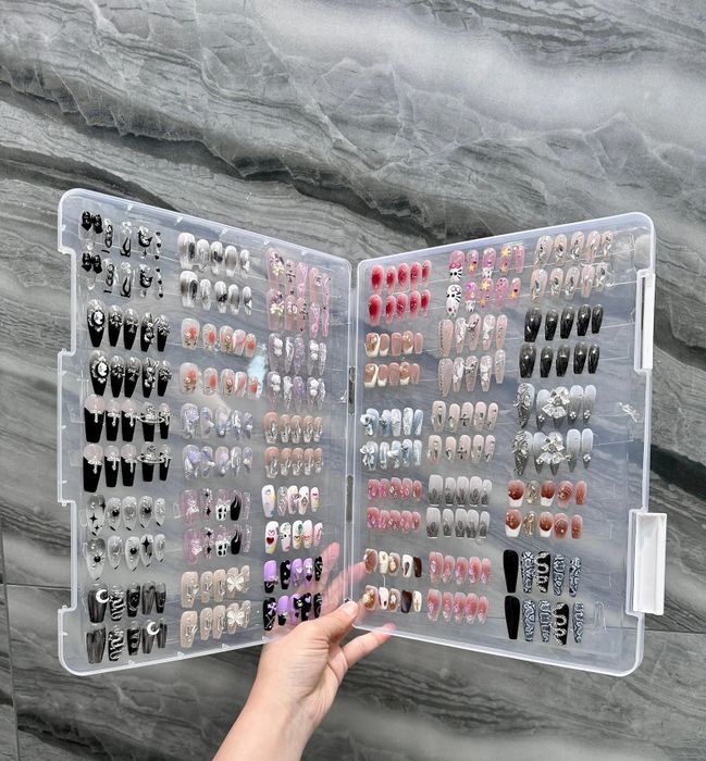 An open file displaying various press-on nails